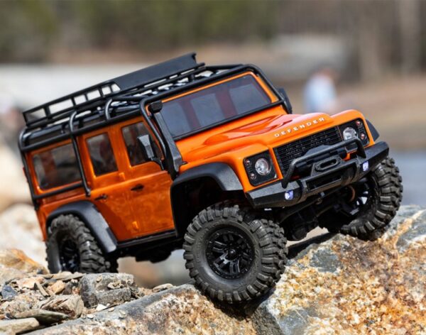 Traxxas TRX-4M 1/18 Land Rover Defender RTR Oranz - 2S LiPo/USB Charger