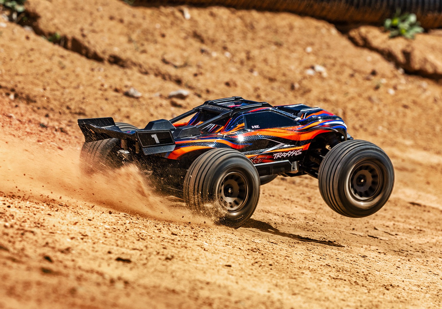 Traxxas Mini XRT Oranz Traxxas Mini XRT VXL-3s RC Auto Oranz 4 Traxxas Mini XRT VXL-3s remote control car orange color action TRX108076-1 RTR RC Car in rc-modelshop.com