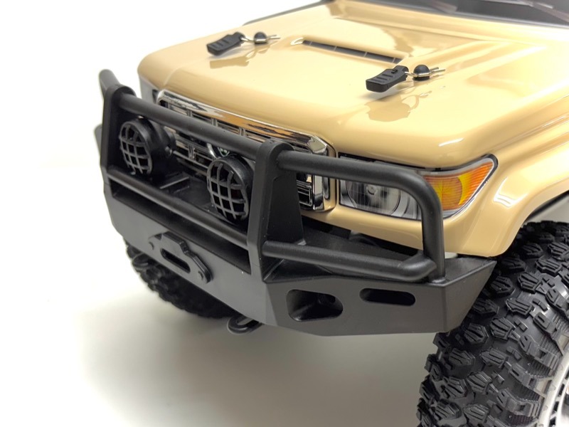 Absima 1:10 Crawler CR4.4eco HILUX Liivakarva RTR RC Auto #12051 6 Absima 1:10 Crawler CR4.4eco HILUX Sand-colored RTR RC Car #12051